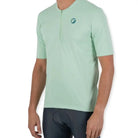 Apace Women's Cruise Cycling T-shirt in mint green, casual fit, made of lightweight fabric, displayed flat on white background.