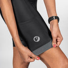 Apace women's cycling bib shorts in black, featuring adjustable straps and padded seat for comfortable bike rides.