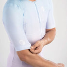 Apace women's cycling race fit jersey with short sleeves, lightweight fabric, and race-ready design, displayed on a hanger.