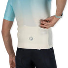 Apace Women's Elite Fit Cycling Jersey in mountain lime color, showcasing a fitted design with breathable fabric and short sleeves.