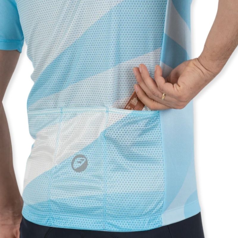 Apace women's relaxed fit cycling jersey in blue with short sleeves and a full front zipper, designed for comfortable riding.