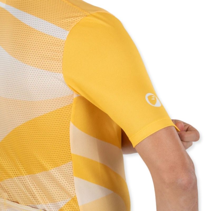 Apace women's relaxed fit cycling jersey in yellow with short sleeves and breathable fabric, designed for comfortable riding.