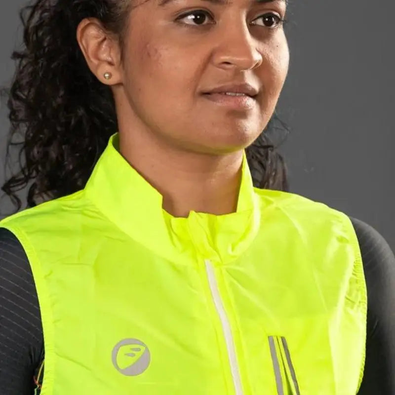 Apace women's sleeveless sports vest jacket in neon color, showing its lightweight design and breathable fabric.
