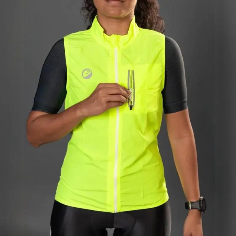 Apace women's sleeveless sports vest jacket in neon color, lightweight and fitted, designed for active outdoor wear.