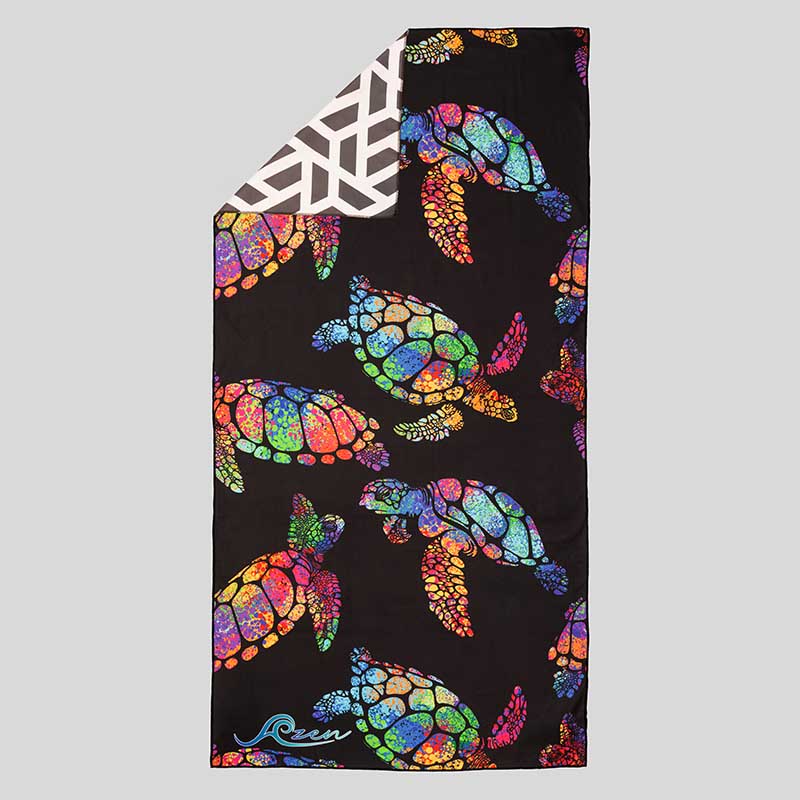 Black Azen unisex microfiber beach towel laid flat, showcasing its soft, quick-drying fabric and versatile design for beach use.