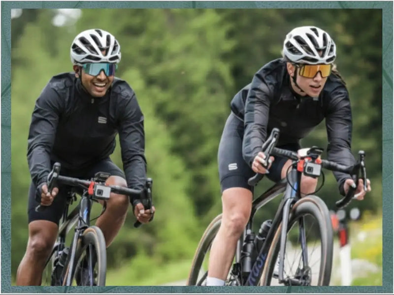 Black cycling jerseys with a subtle white logo on the chest.