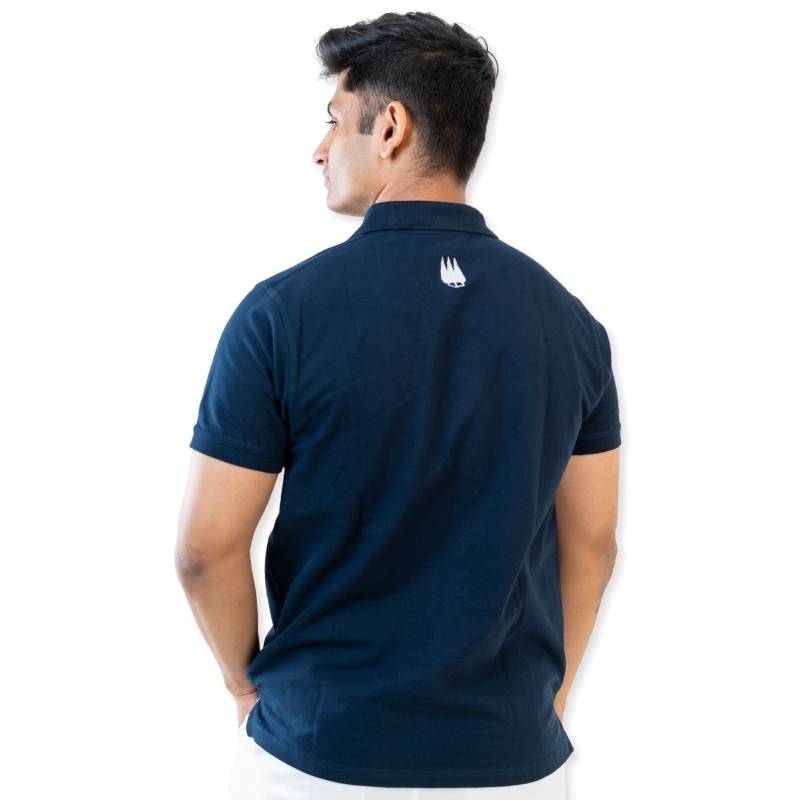Clawear Men’s Bandhavgarh Polo T-shirts in blue, featuring a classic polo collar and short sleeves, displayed on a hanger.