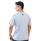 Clawear men's Jhalana T-shirt with side zip, featuring a casual fit and graphic design in grey, shown on a model.