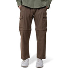 Clawear men's Kuno convertible cargo pants in brown, showing adjustable waistband and multiple cargo pockets.