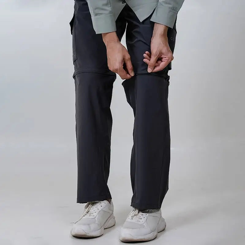 Clawear men's Kuno convertible cargo pants in gray, featuring multiple pockets and adjustable design for versatile wear.