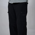 Black Clawear Kuno convertible cargo pants for men, featuring multiple pockets and adjustable design for versatile wear.