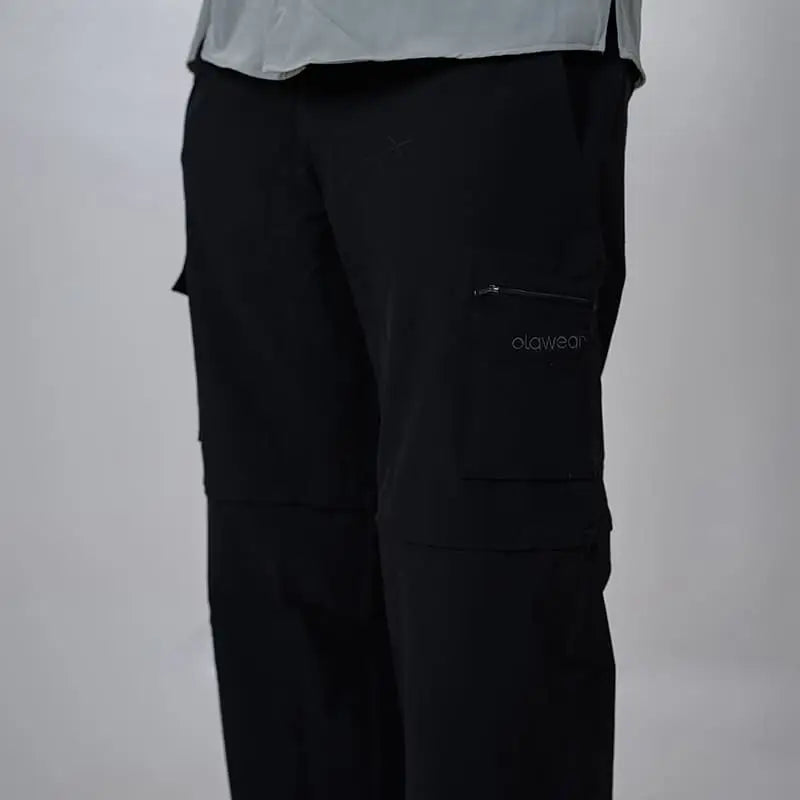 Black Clawear Kuno convertible cargo pants for men, featuring multiple pockets and adjustable design for versatile wear.