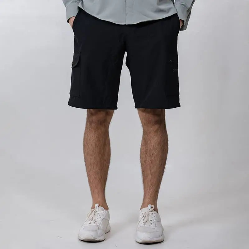 Black Clawear Men's Kuno convertible cargo pants with multiple pockets and adjustable features, designed for versatile comfort.