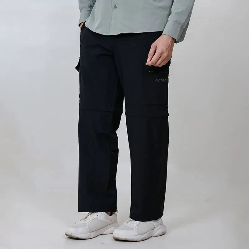 Black Clawear Kuno convertible cargo pants for men, featuring multiple pockets and adjustable design, casual and versatile style.