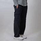 Gray Clawear men's Kuno convertible cargo pants with multiple pockets and adjustable features, displayed on a hanger.