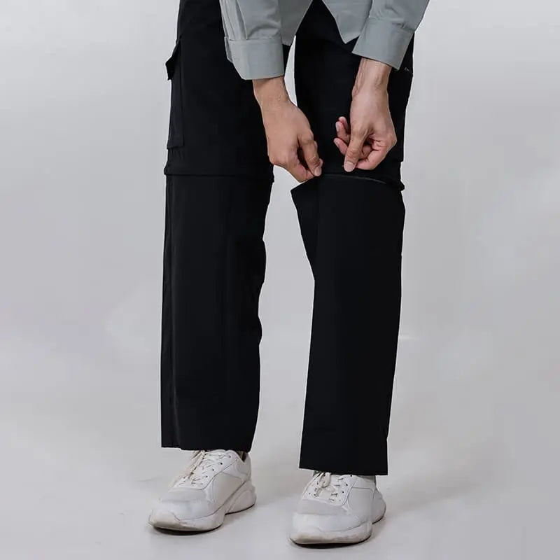 Black Clawear Kuno convertible cargo pants for men showing multiple pockets and adjustable features, casual and functional style.