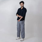 Clawear men's Masai cargo pants with multiple pockets in dark green, casual style, front view showing relaxed fit and durable fabric.