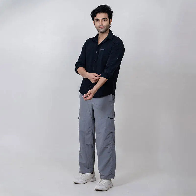 Clawear men's Masai cargo pants with multiple pockets in dark green, casual style, front view showing relaxed fit and durable fabric.