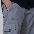 Clawear Men's Masai Cargo Pants in dark green with multiple pockets, relaxed fit, and durable fabric for casual wear.
