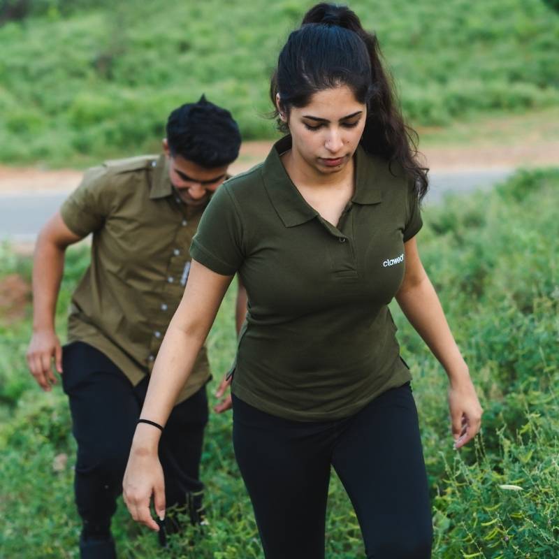 Green Clawear Women's Jawai Polo T-shirt with a classic collar and subtle logo detail on the chest.