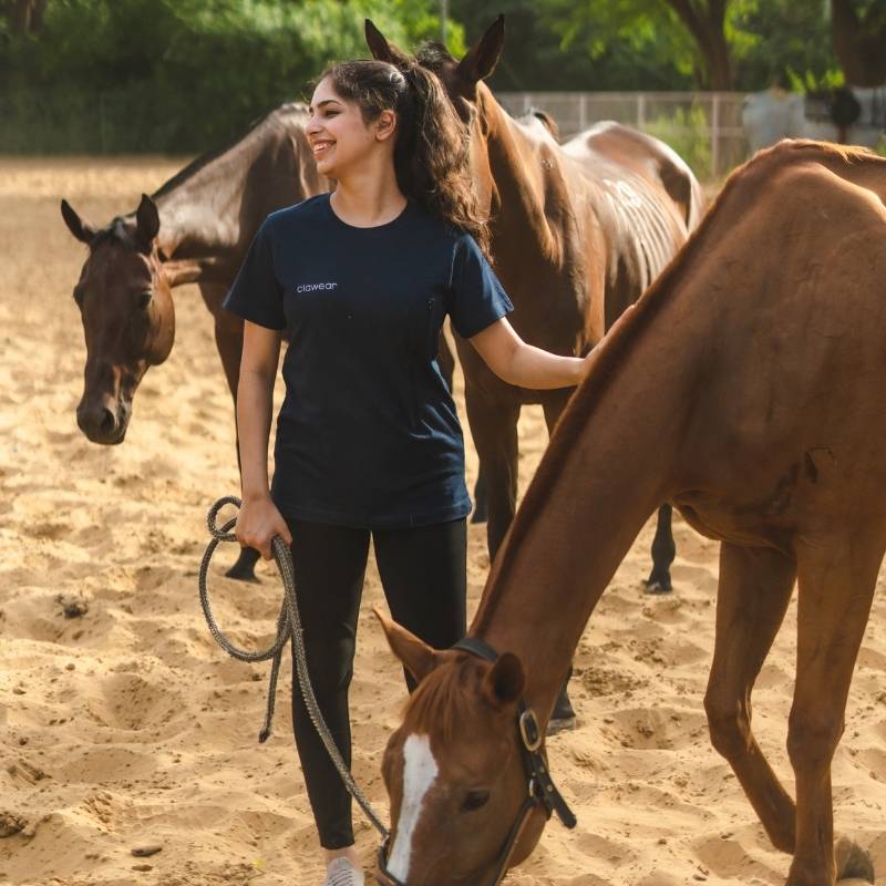 Clawear Women's Jhalana T-shirt with side zipper in blue, casual fit, short sleeves, and round neckline.