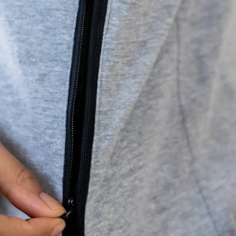 Clawear Women's Jhalana T-shirt with side zip, casual fit in grey, laid flat showing front and side details.