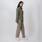 Clawear Women's Kuno Convertible Cargo Pants in black, featuring multiple pockets and adjustable hems for versatile style and comfort.