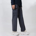 Clawear Women's Kuno Convertible Cargo Pants in gray, featuring multiple pockets and adjustable design for versatile wear.