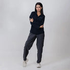Clawear Women's Kuno Convertible Cargo Pants in dark gray, featuring multiple pockets and adjustable cuffs.