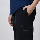 Black Clawear women's Kuno convertible cargo pants with multiple pockets and adjustable features, shown in a relaxed fit.