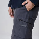 Clawear Women's Kuno Convertible Cargo Pants in gray, featuring multiple pockets and adjustable design for versatile wear.