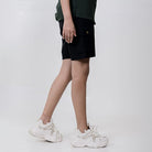 Black Clawear Women's Mara Cargo Shorts with multiple pockets, casual fit, and durable fabric, suitable for outdoor or everyday wear.