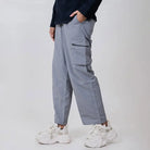 Clawear Women's Masai cargo pants in olive green with multiple pockets, relaxed fit, and durable fabric.
