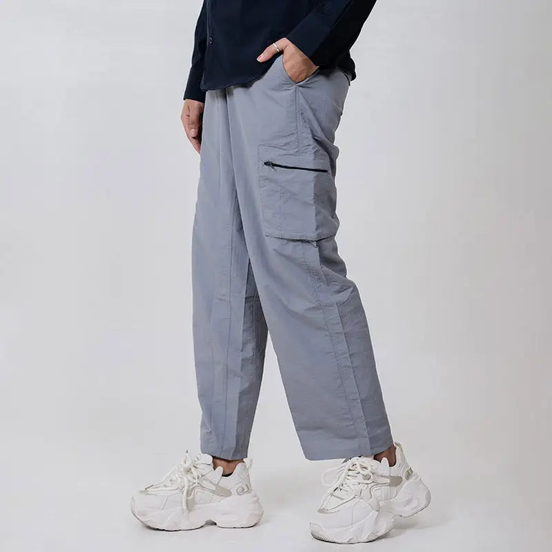 Clawear Women's Masai cargo pants in olive green with multiple pockets, relaxed fit, and durable fabric.