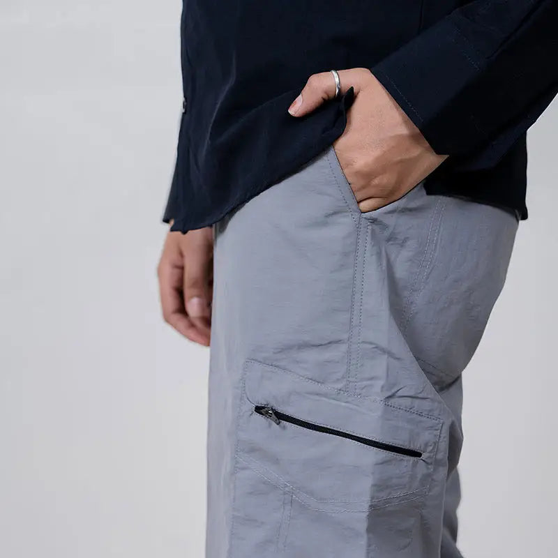 Clawear Women's Masai Cargo Pants in grey with multiple pockets, relaxed fit, and functional design for casual wear.