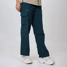 Clawear Women's Masai Cargo Pants in green, featuring multiple pockets and a relaxed fit, made of durable fabric.