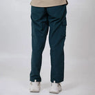 Clawear women's Masai cargo pants in green, featuring multiple pockets and a relaxed fit, made of durable fabric.