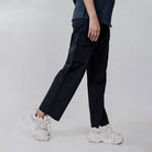 Black Clawear Women's Masai Cargo Pants with multiple pockets and relaxed fit, designed for comfort and style.