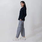 Clawear Women's Masai Cargo Pants in olive green, made of durable fabric, featuring multiple pockets and relaxed fit.