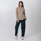 Clawear Women's Masai cargo pants in green, featuring multiple pockets and relaxed fit, made for comfortable casual wear.