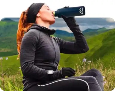 Dark blue insulated water bottle with a sleek, modern design and the brand logo visible on its side.