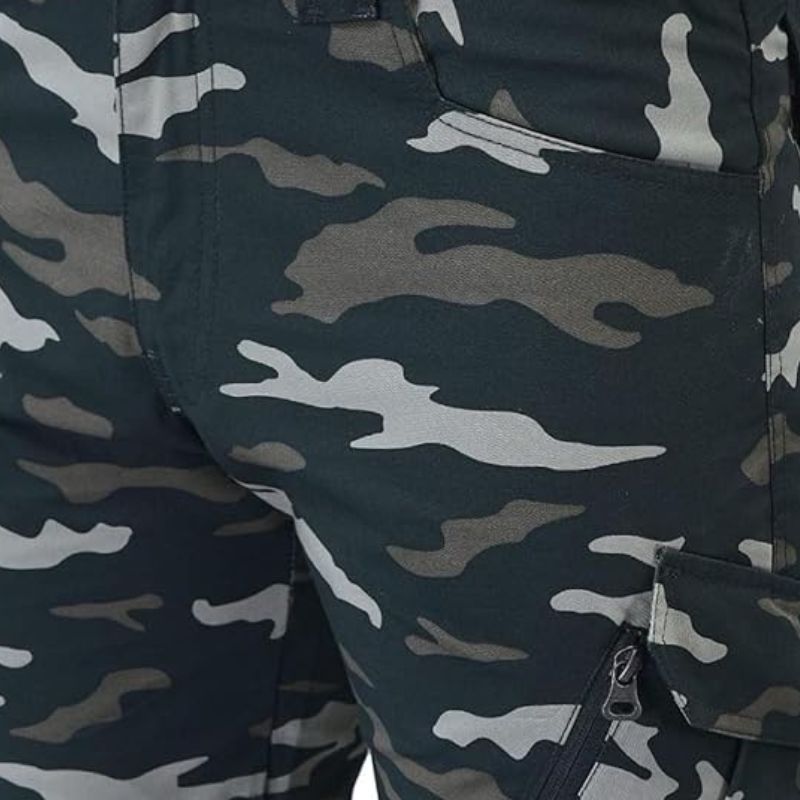 Indian Sports Gear men's Cobra Combat tactical cargo pant in green, featuring multiple pockets and durable fabric for outdoor activities.