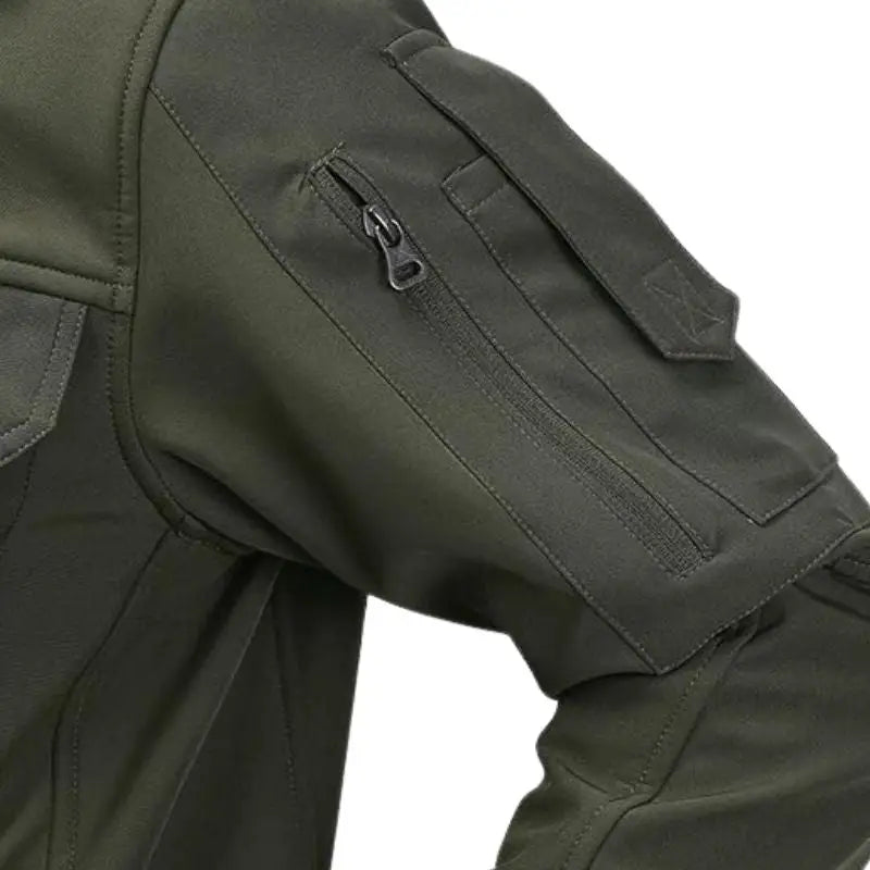Indian Sports Gear men's tactical soft shell wind jacket in green, water-resistant and windproof for outdoor activities.