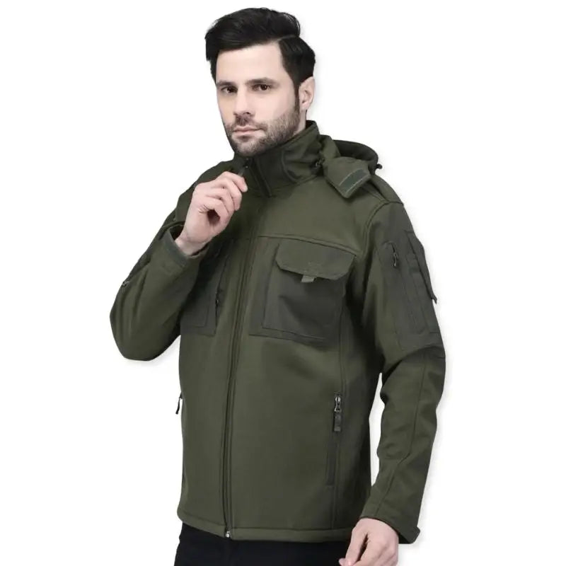 Indian Sports Gear men's tactical soft shell wind jacket in green, windproof and water-resistant for outdoor activities.