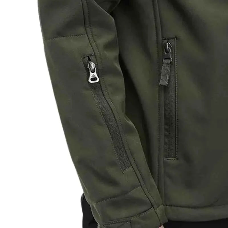 Indian Sports Gear men's tactical soft shell wind jacket in green, windproof and water-resistant for outdoor activities.