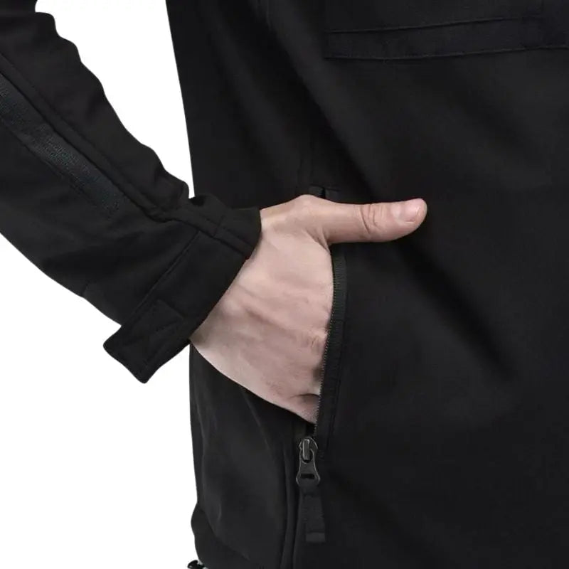 Indian Sports Gear men's tactical soft shell wind jacket in black, windproof and water-resistant, suitable for outdoor activities.