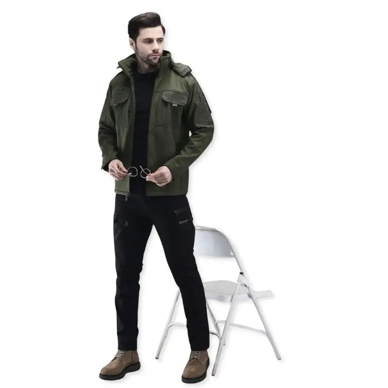 Indian Sports Gear men's tactical soft shell wind jacket in green, windproof and water-resistant for outdoor activities.
