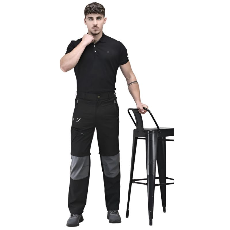 Indian Sports Gear men's Voyager cargo pants in black and gray, featuring detachable sections and multiple pockets.