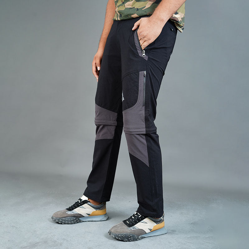 Black JAG Men's Delta 2.0 convertible trekking and hiking pants with six pockets, designed for outdoor activities and mobility.