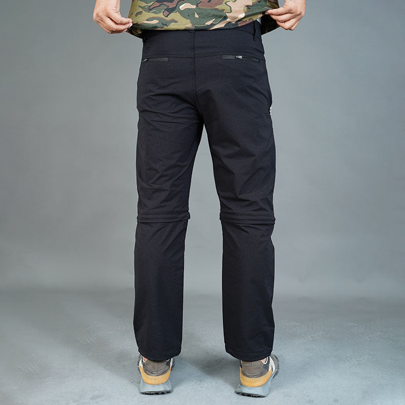 Black JAG Men's Delta 2.0 convertible trekking and hiking cargo pants with six functional pockets, suitable for outdoor adventures.